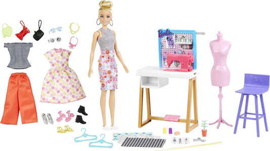 Barbie Fashion Designer Doll with design desk, sewing machine, accessories, and mannequin for creative play.