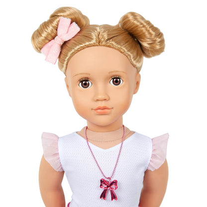 Our Generation Thea doll with blond hair, hazel eyes, bow-themed outfits, and styling accessories in a gift box.