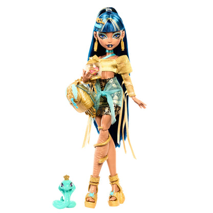 Cleo De Nile doll in golden blouse and layered skirt with pet cobra Hissette and accessories like backpack and snack.