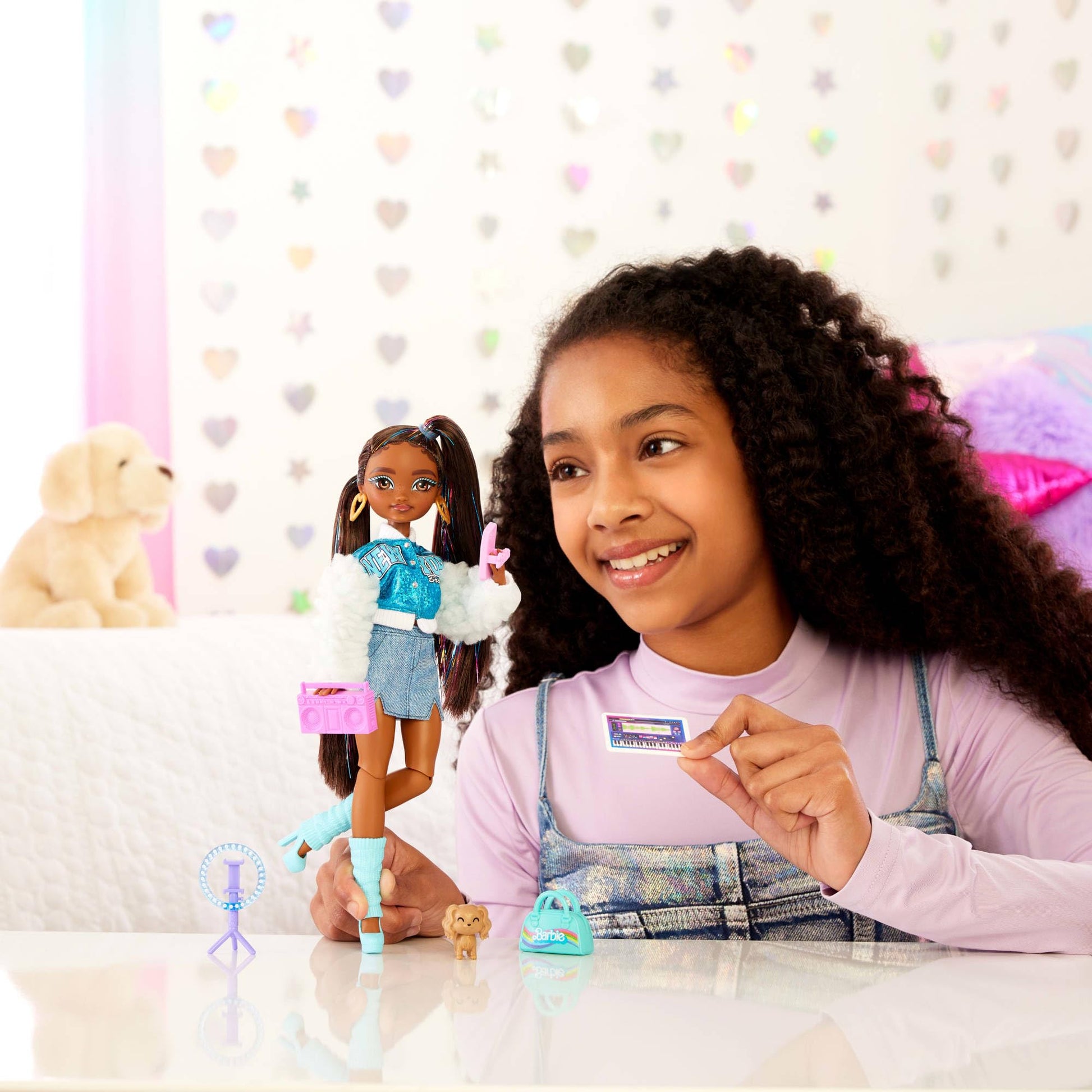 Barbie Dream Besties Playset featuring posable Brooklyn doll with long black hair and 9 music-themed accessories.