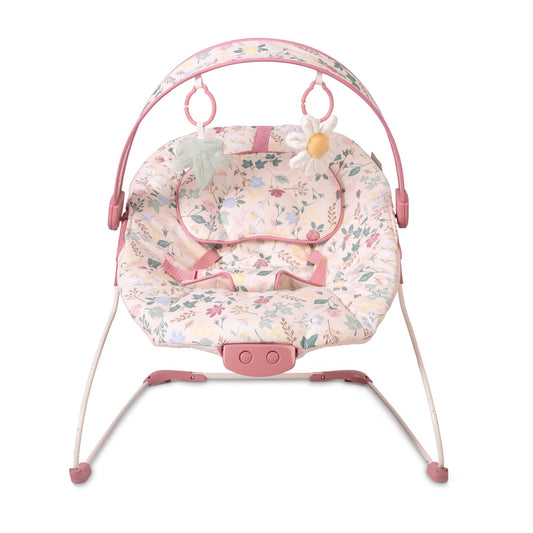 Red Kite Cozy Bounce musical baby bouncer in rose and ivy colors, featuring a soft fabric seat and musical toy arch for infants.