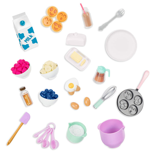 Our Generation pancake breakfast kit with realistic toy food accessories for 18-inch dolls, featuring 23 pieces.