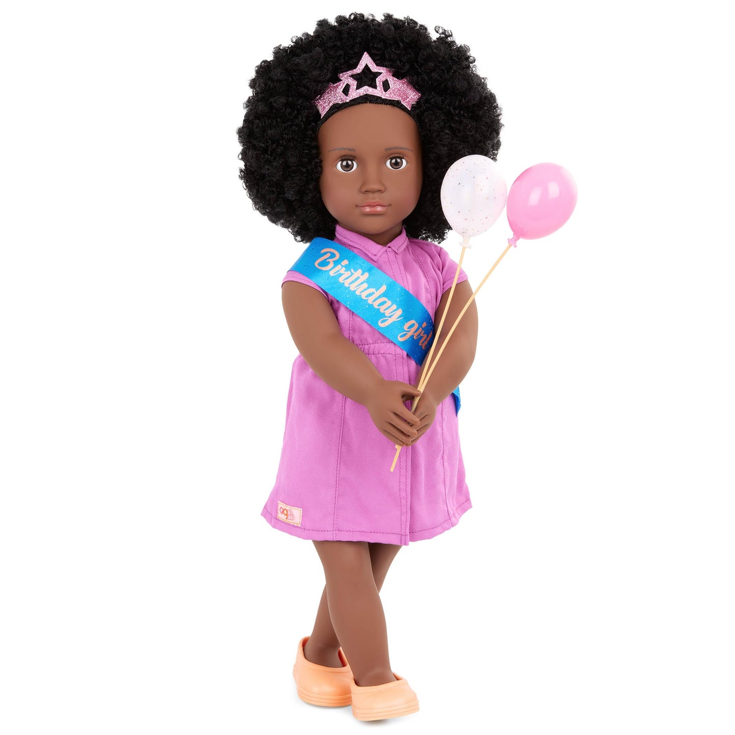 Our Generation 18-inch Khelani doll with birthday party accessories, featuring a festive outfit and fun decorations.