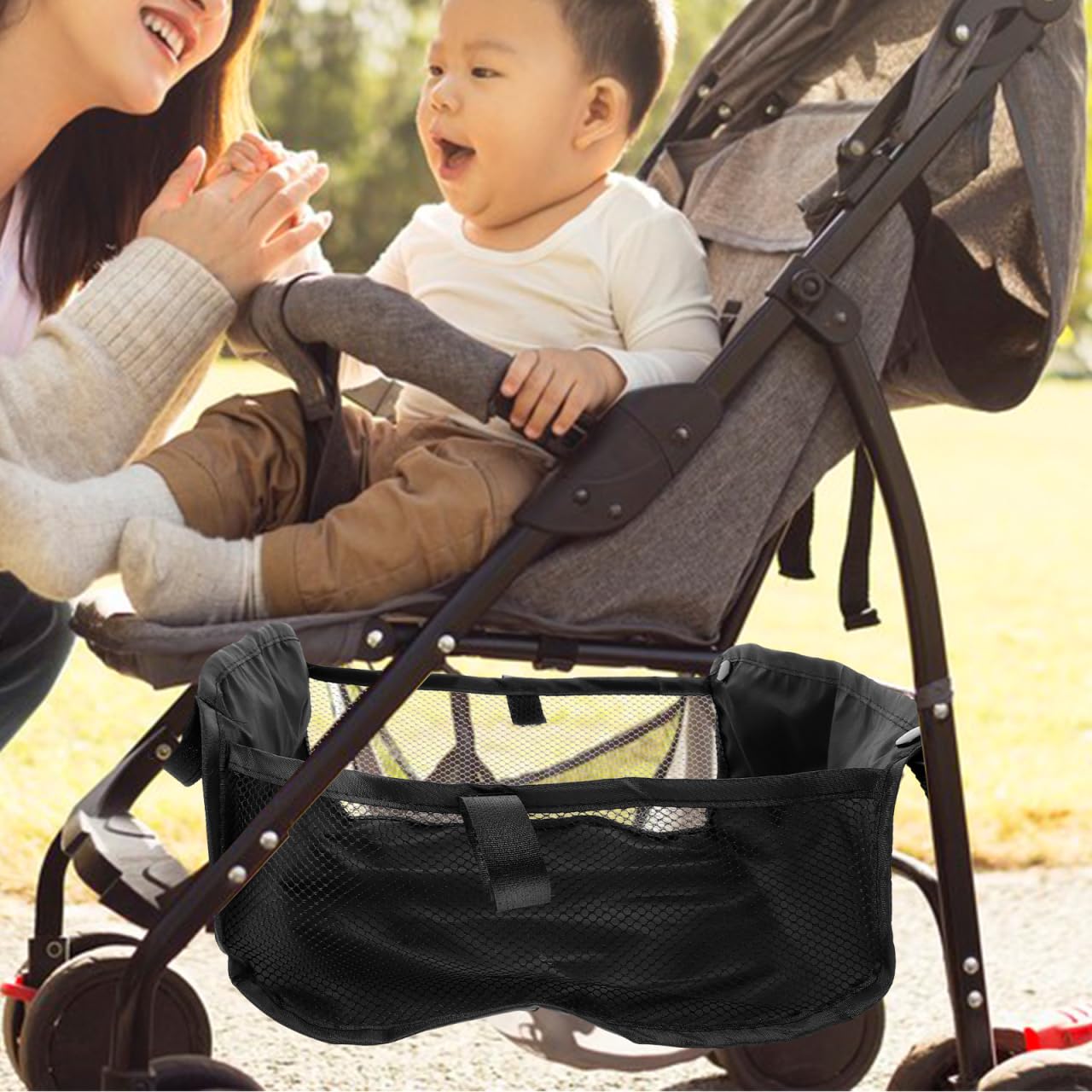 VICASKY black baby stroller bottom storage basket attached to pushchair for convenient shopping and stroller organization.