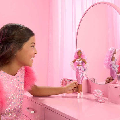 Barbie Deluxe Style Doll #1 in pink dress, pink hair, and accessories like velvet gloves and money purse.