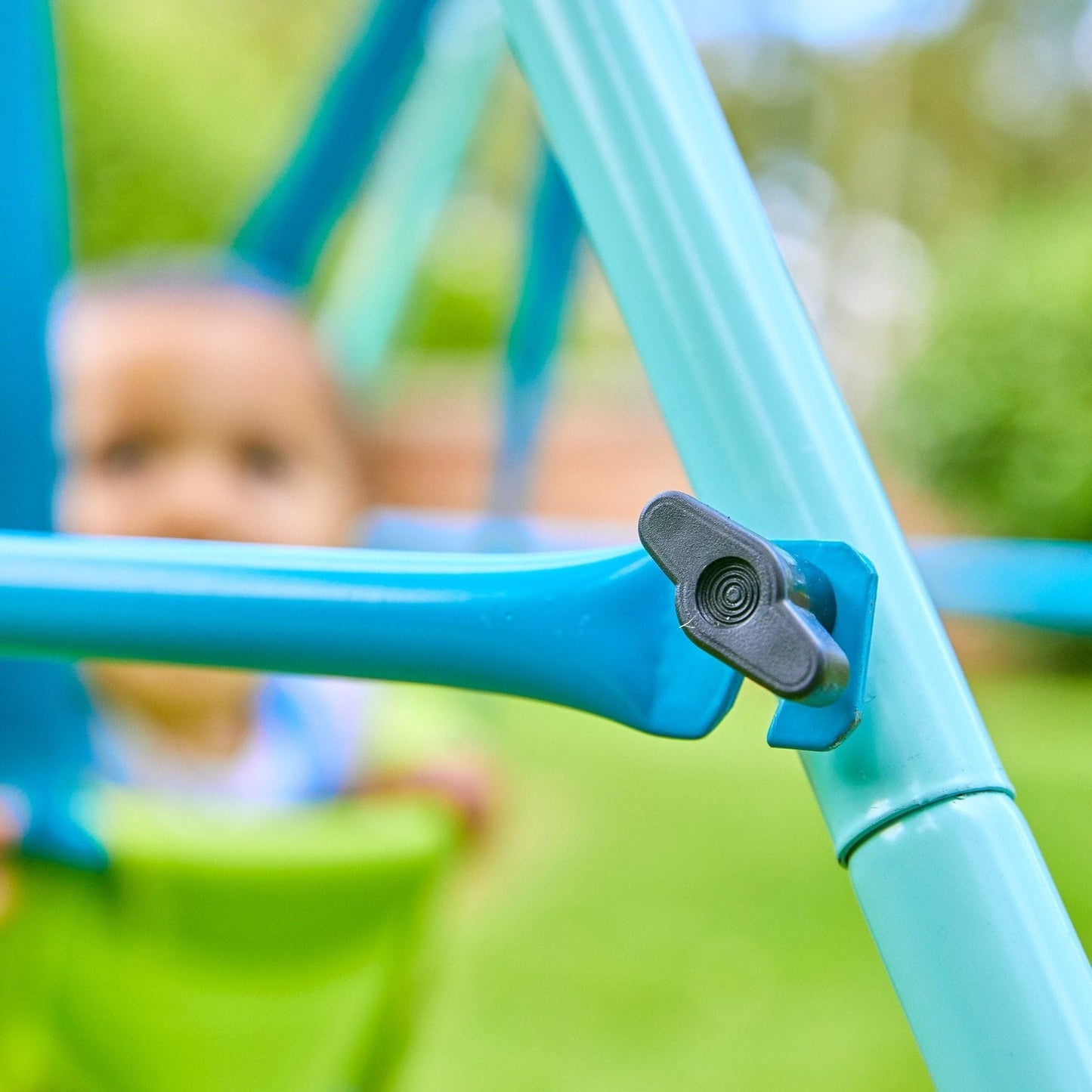 TP Toys foldaway baby swing with powder-coated metal frame, non-slip feet, and compact design for indoor and outdoor use.
