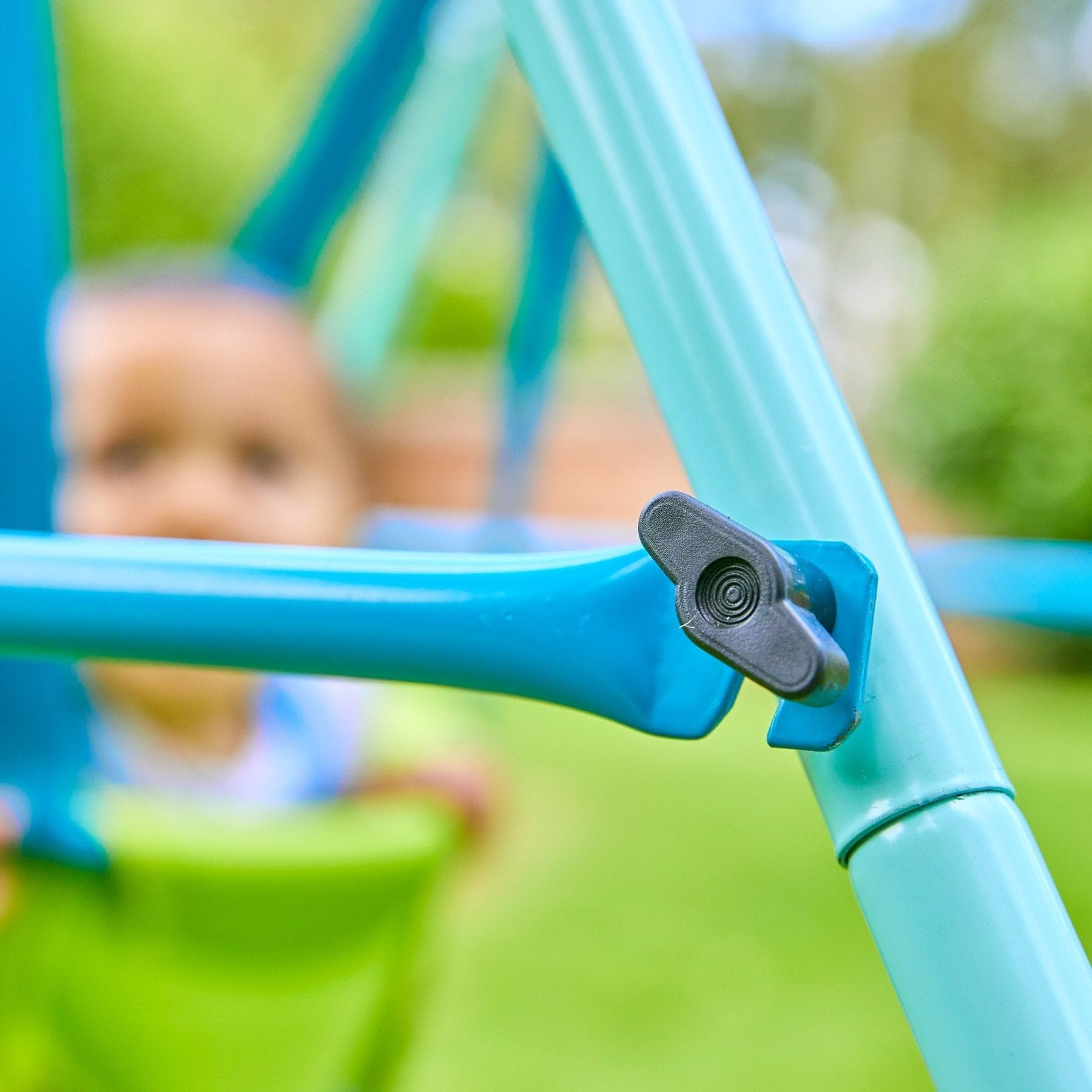 TP Toys foldaway baby swing with powder-coated metal frame, non-slip feet, and compact design for indoor and outdoor use.