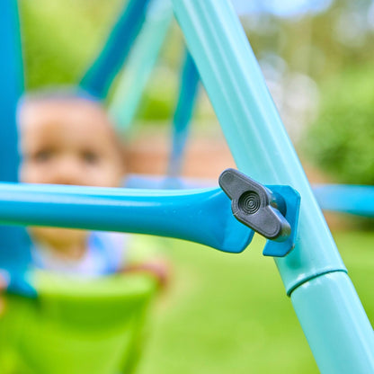TP Toys foldaway baby swing with powder-coated metal frame, non-slip feet, and compact design for indoor and outdoor use.