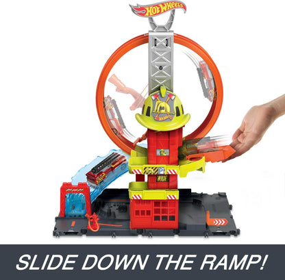 Hot Wheels City playset featuring a toy car, kid-powered elevator, water-like ramp, and fire station with super loop.