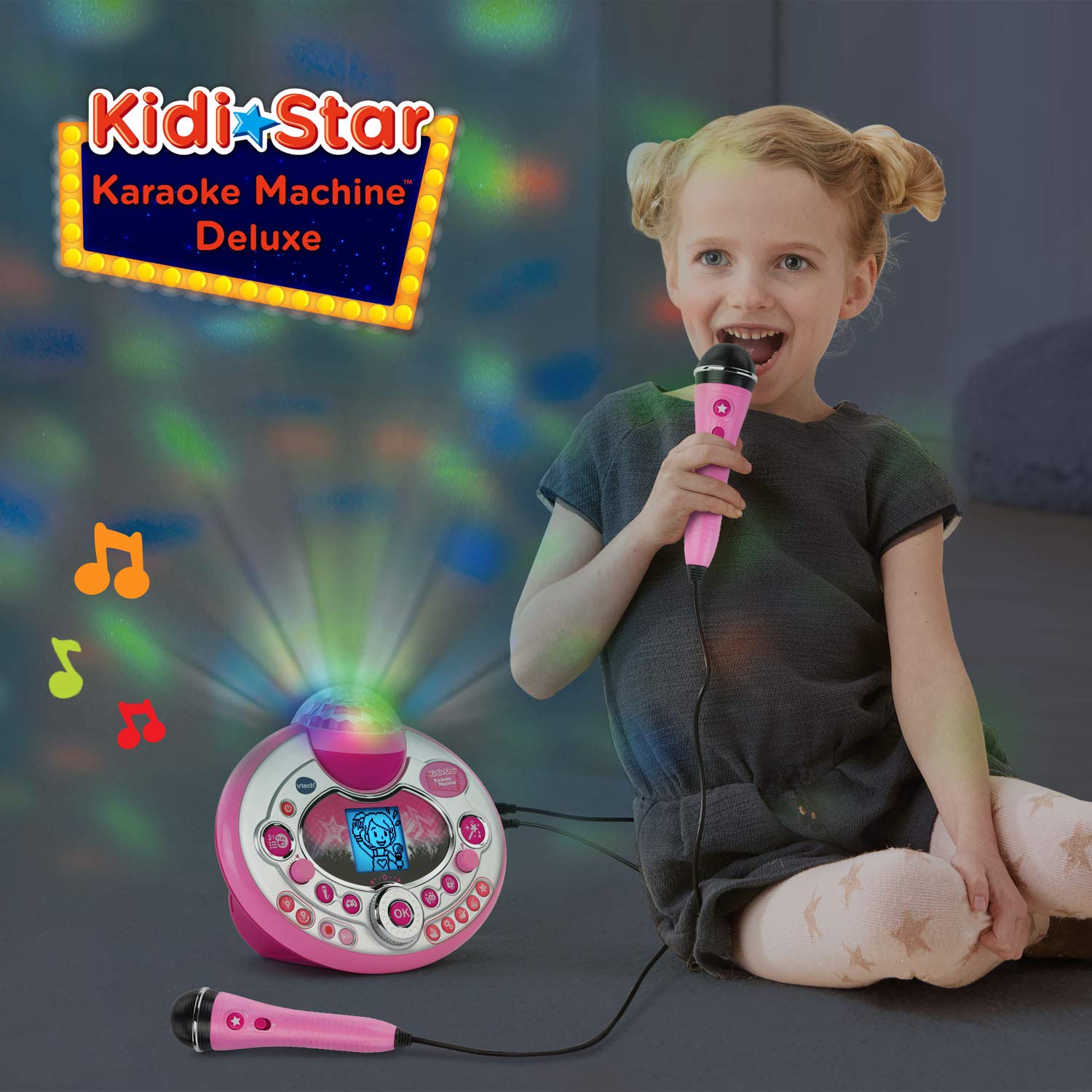 VTech Kidi Star karaoke system in pink with two microphones, microphone stand, and AC adapter, ready for kids' singing fun.
