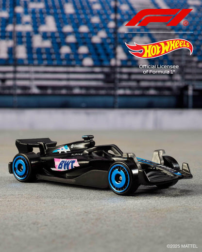 Hot Wheels 1:64 scale Formula 1 toy cars, set of 5 die-cast vehicles with racing team designs on display.