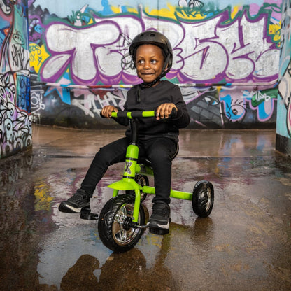 Xootz tricycle for kids with easy clip design, showcasing bright colors and portable features for outdoor fun.