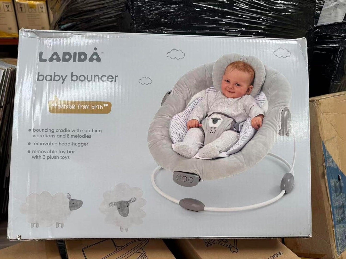 LADIDA Soft Padded Lamb Bouncer for newborns 0-6 months with plush fabric, soothing music, and gentle vibration.
