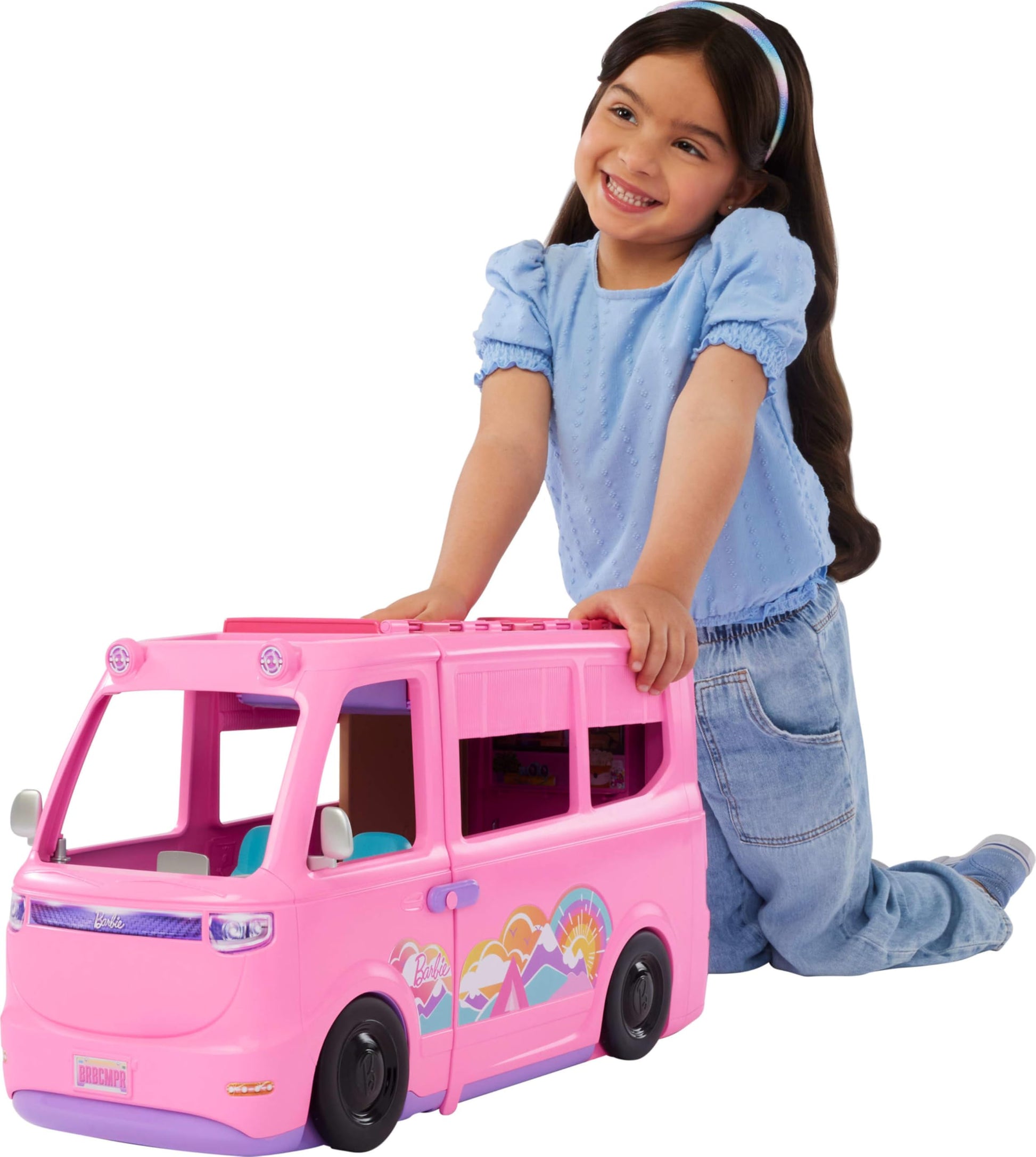 Barbie Dream Camper playset with roof tent, swing chair, fishing pond, BBQ grill, and 60+ accessories, including dough.