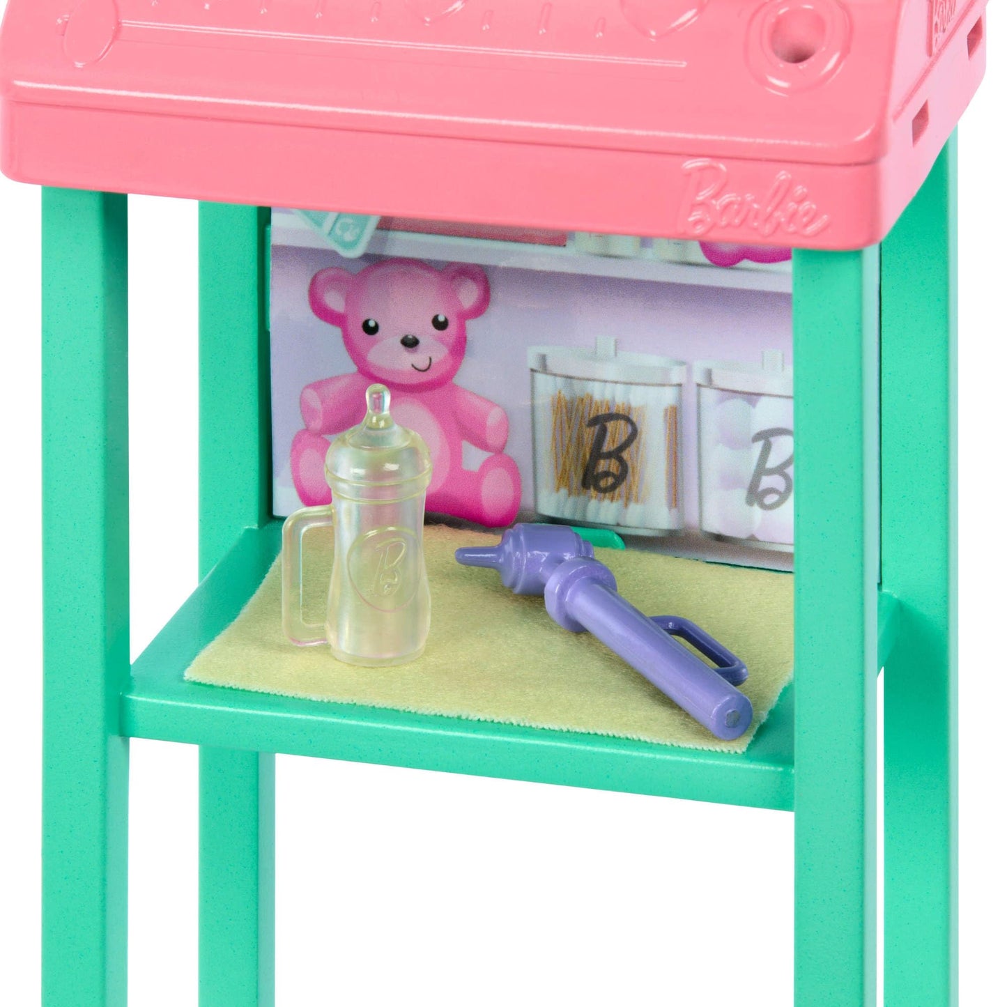 Barbie Baby Doctor doll with blonde hair in pink scrubs, includes baby accessories and furniture for imaginative play