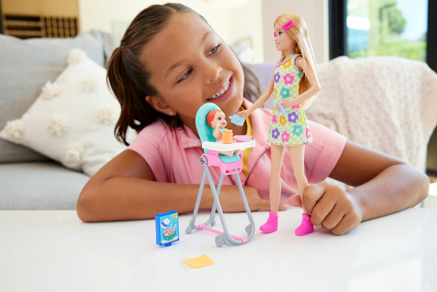 Barbie Skipper doll with accessories in a mealtime-themed babysitting playset, featuring color-change toy elements.