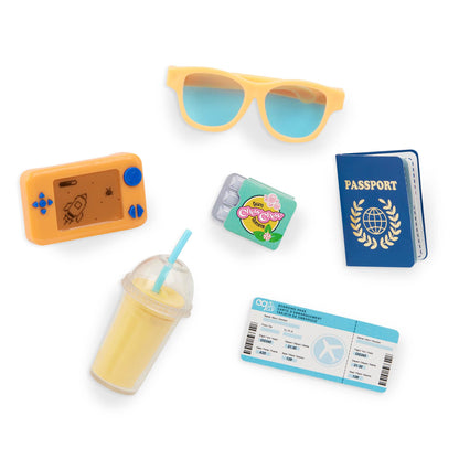 18-inch Our Generation Milo boy doll with travel accessories, passport, luggage, and sunglasses for imaginative play.