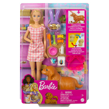 Barbie doll playset featuring a blonde doll, mommy dog, three puppies, and 11 accessories in a colorful scene.