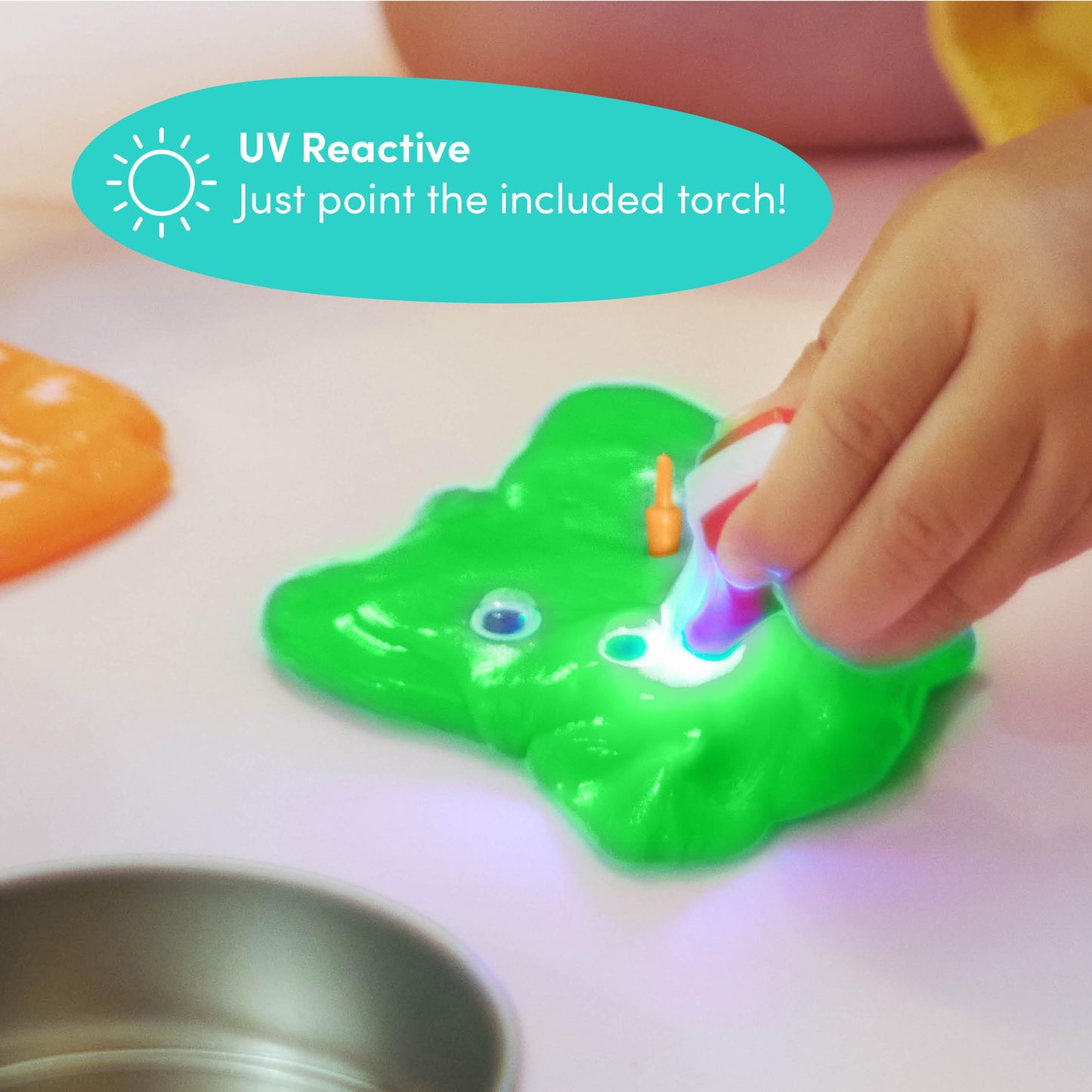 Color-changing putty in lid pots with mini UV torch, featuring vibrant slime for kids' sensory play and creative art activities.