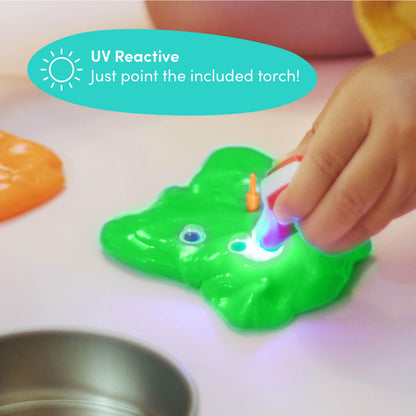 Color-changing putty in lid pots with mini UV torch, featuring vibrant slime for kids' sensory play and creative art activities.
