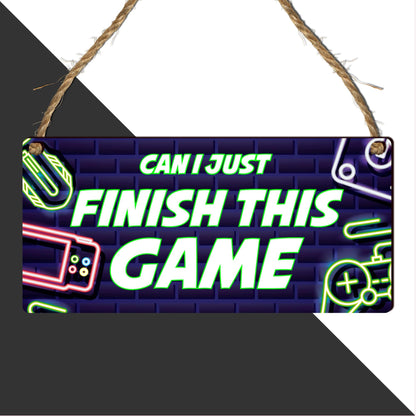 Wooden gamer plaque by Pixie's Gifts featuring gaming-themed design, ideal for bedroom decor for Xbox and PlayStation fans.