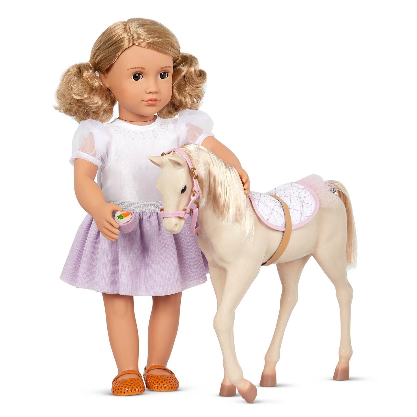 12-inch Our Generation Palomino Party Foal doll with birthday-themed treats and 5-piece accessory set displayed.