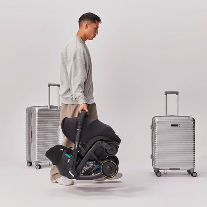 Doona X Baby Car Seat & Travel Stroller Nitro Black - Convertible 0+ Car Seat and Pram with 3 Recline Positions - Ergonomic Pushchair and Travel System - ISOFIX Base Sold Separately