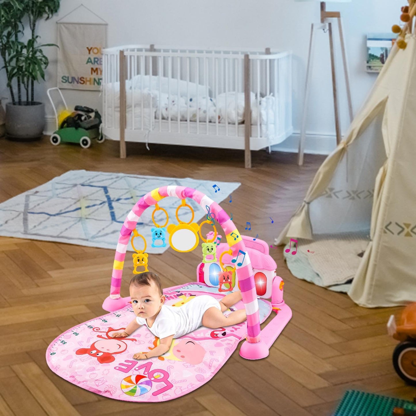 Ylnailky baby gym play mat with colorful toys, piano music feature, suitable for infants 0-36 months, with cartoon piano design.