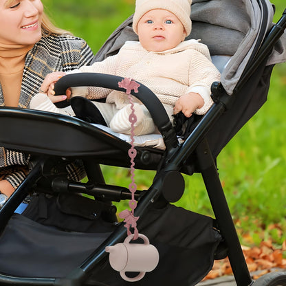 PandaEar silicone baby toy straps with dinosaur design, adjustable pacifier holder clips for bottles, strollers, and high chairs.