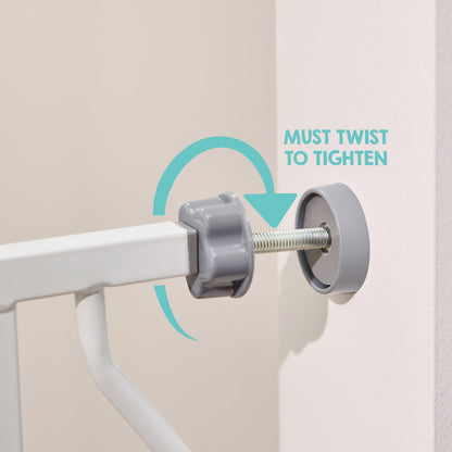 Regalo Easy Step Walk Thru baby safety gate with extension kit, showing pressure-mounted design and secure latch system.