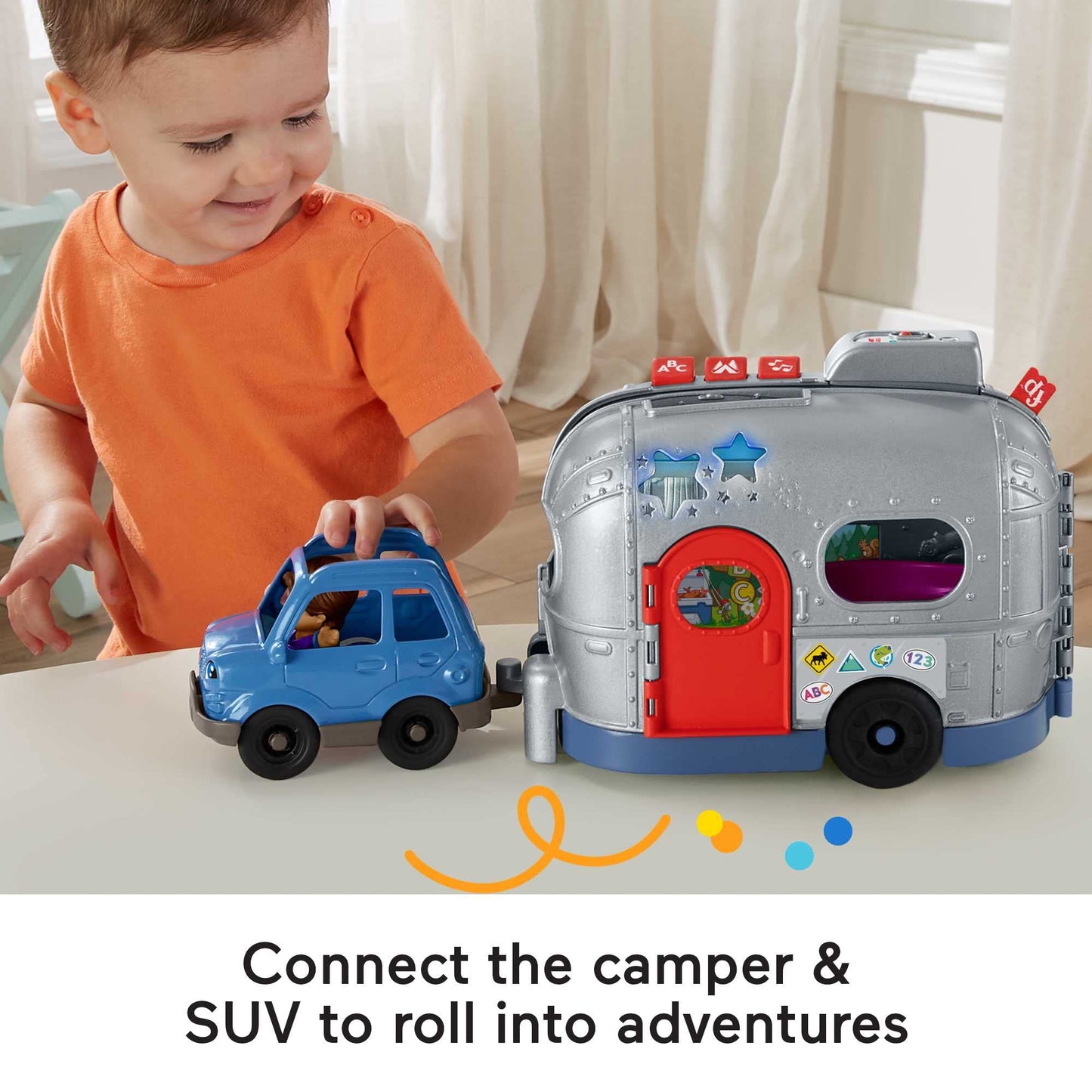 Fisher-Price Little People Light-Up Learning Camper playset with colorful vehicle, lights, and songs for children aged 1 and up.