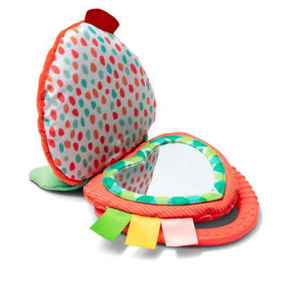 Melissa & Doug multi-sensory peek-a-boo berry travel toy with colorful clips for infants up to 12 months.