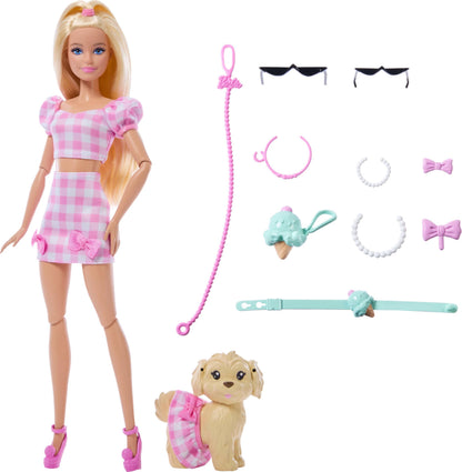 Barbie Twinning Looks Doll in pink gingham outfit with pet dog, sunglasses, necklaces, and bows, featuring blonde hair.