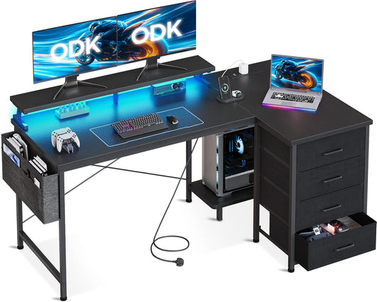 ODK L Shaped Gaming Desk with LED Lights & Power Outlets, 140x80cm Corner Computer Desk with Drawers, Reversible Gaming Table with Monitor Shelf & PC Stand, Black