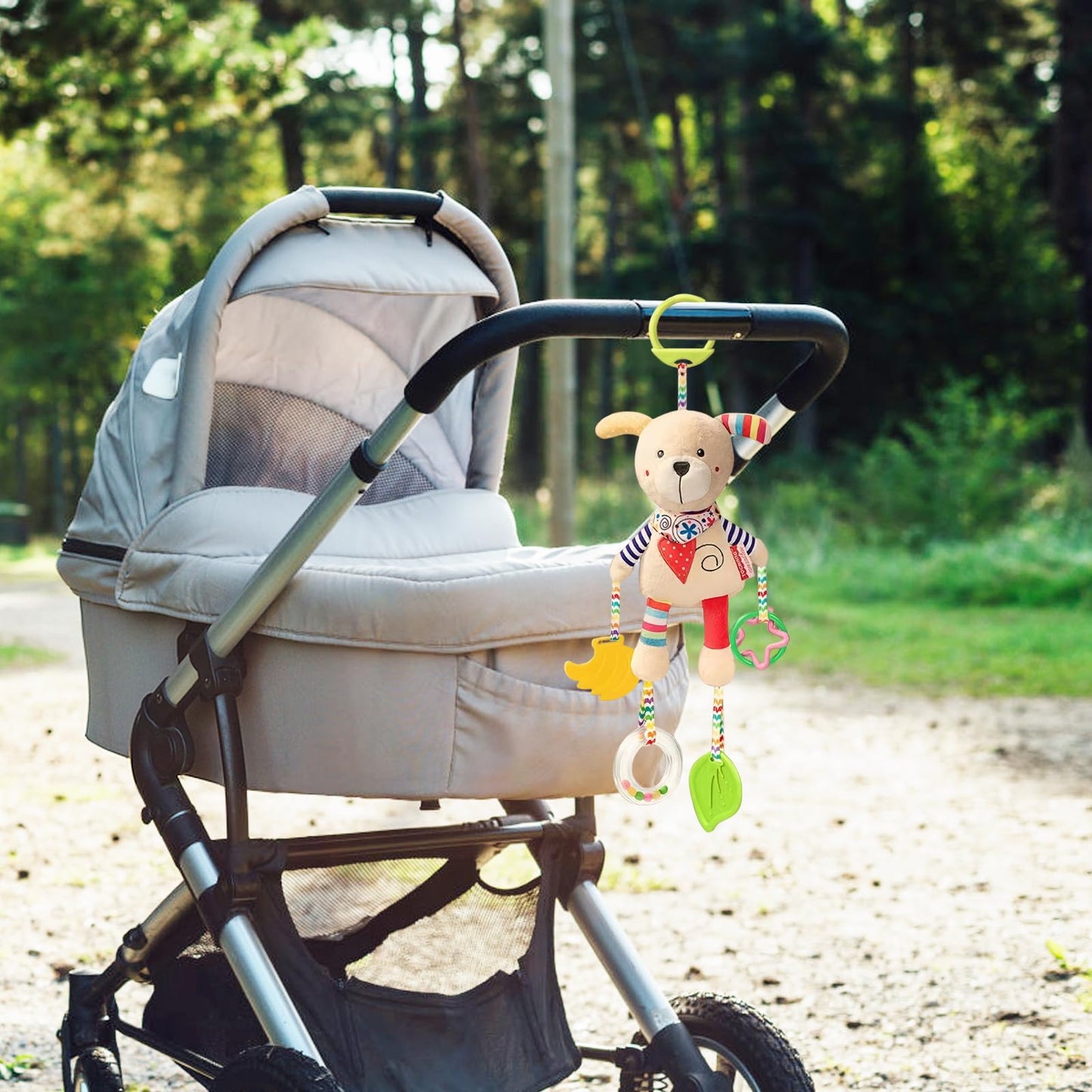 Jodsen baby pram plush sensory toy featuring a cute dog, with teether clip, handbells, and hanging rattles for early development.