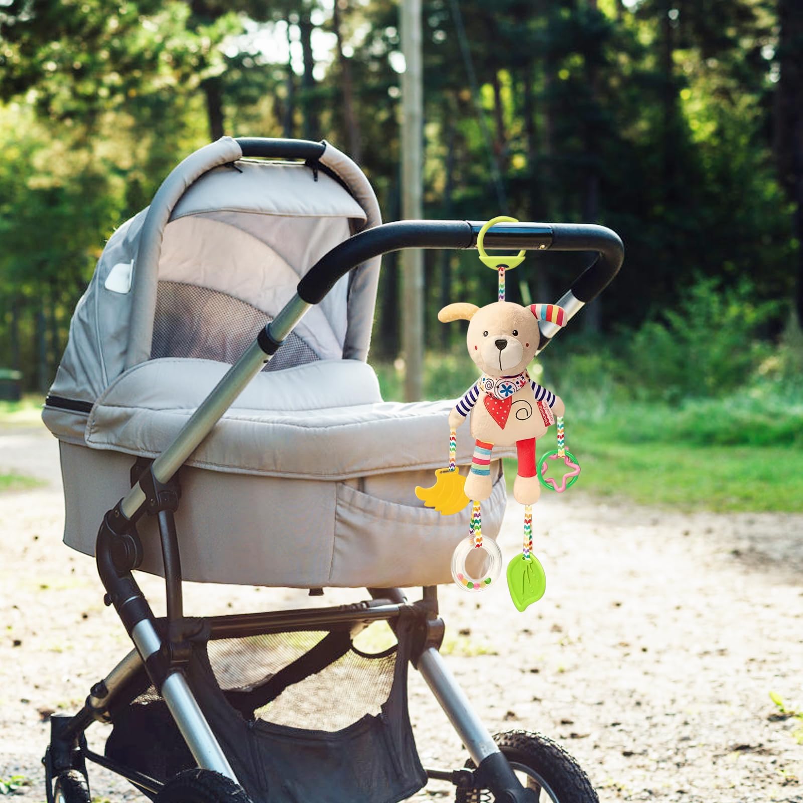 Jodsen baby pram plush sensory toy featuring a cute dog, with teether clip, handbells, and hanging rattles for early development.