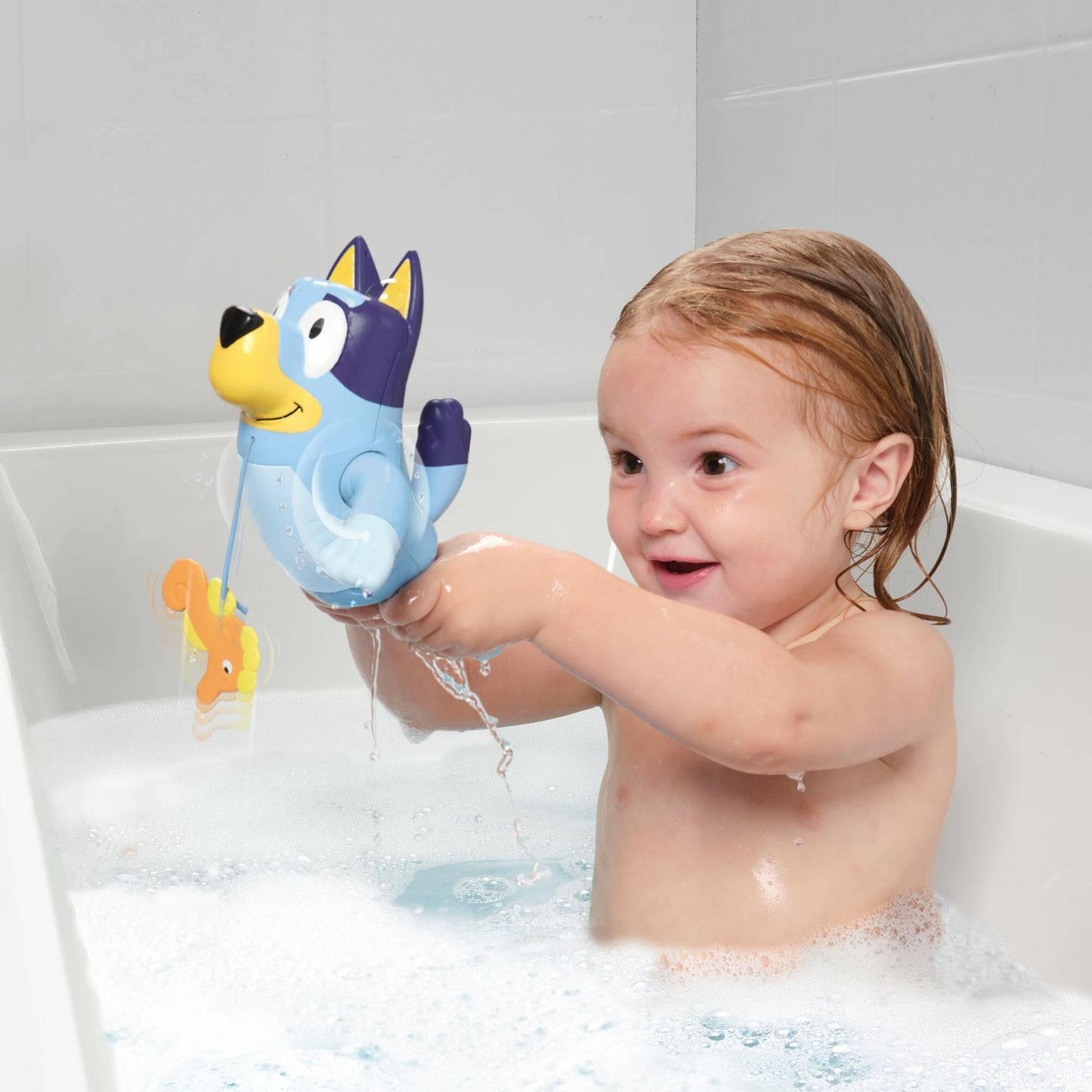 Toomies Swimming Bluey - Toddler Bath Bluey Toy with Pull String Seahorse, Swims on Front and Back - Interactive Water Play Bluey Toys - Baby Bath Toys and Swimming Pool Toys for +18 Months Old