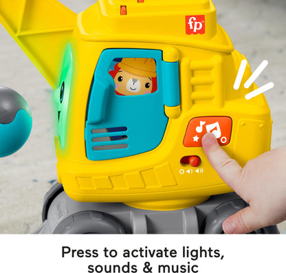 Fisher-Price baby and toddler learning crane toy with colorful blocks, lights, music, and sounds for infants 9 months and older.