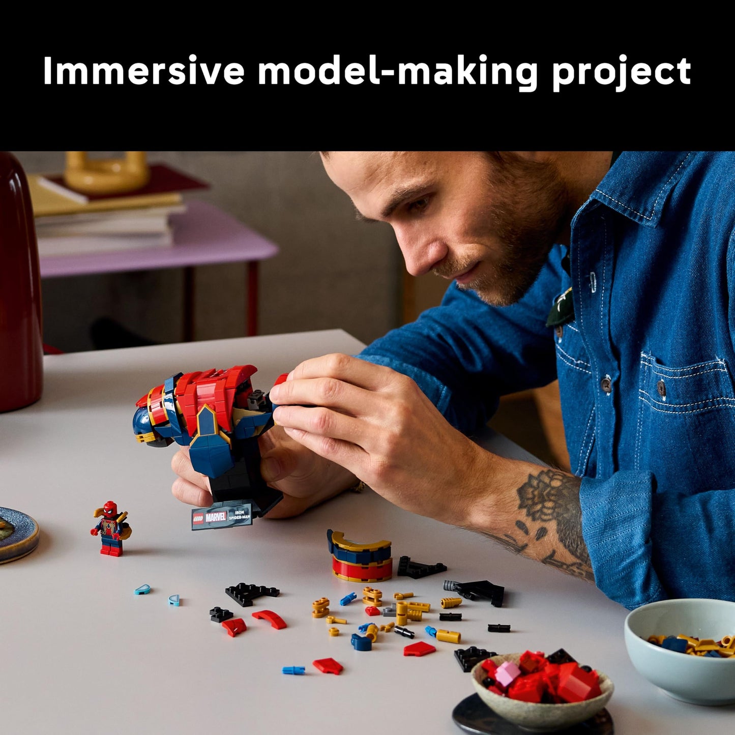 LEGO Marvel Iron Spider-Man Bust display model with movable arms, rotating head, and minifigure, ideal for collectors.