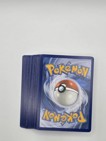 Assorted Pokémon cards featuring various characters, showcasing 50 unique collectible pieces in a vibrant display.