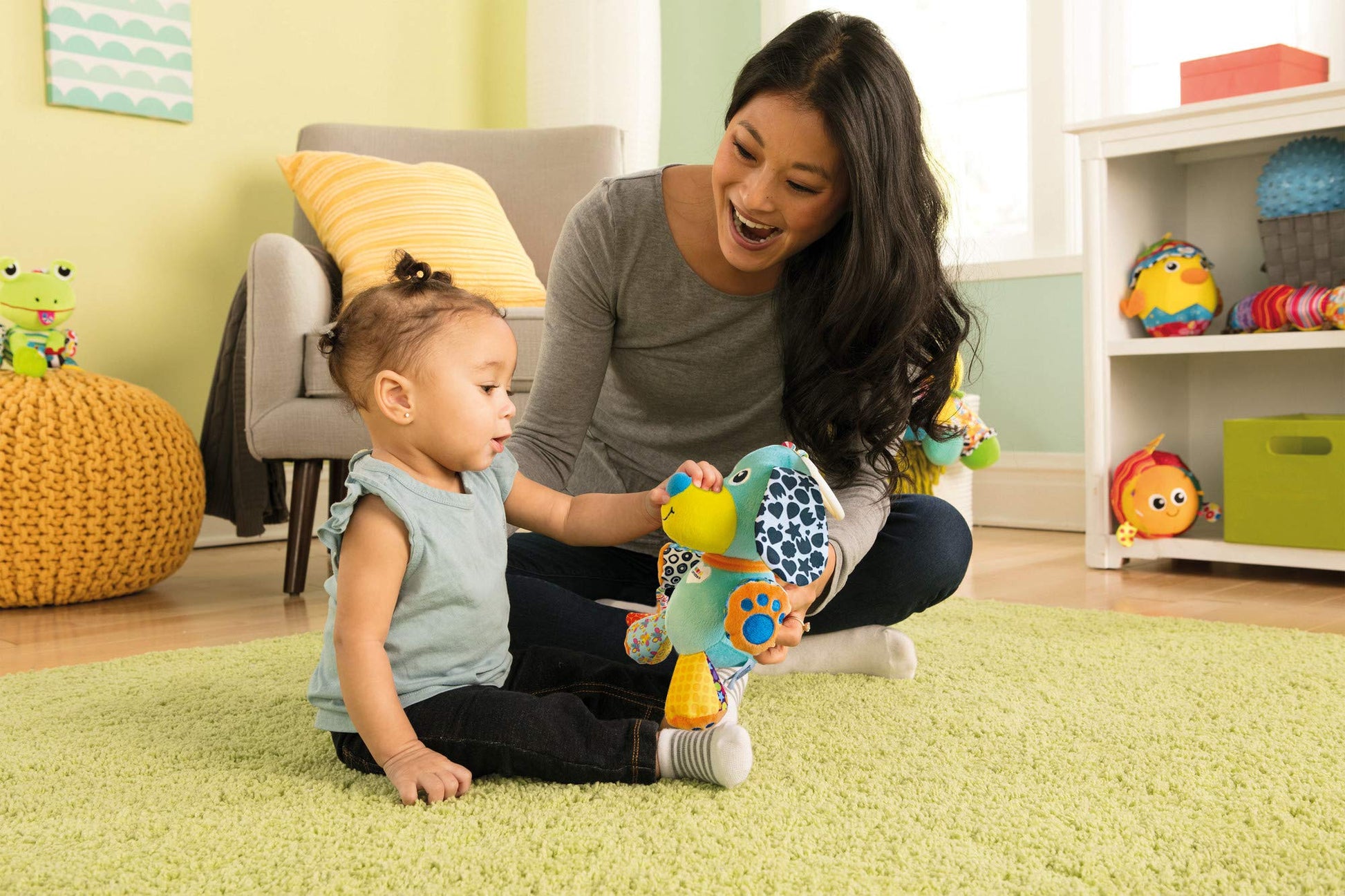 Lamaze Pupsqueak clip and go pram baby toy with soft plush fabric, designed for newborn sensory development and baby’s grasping.