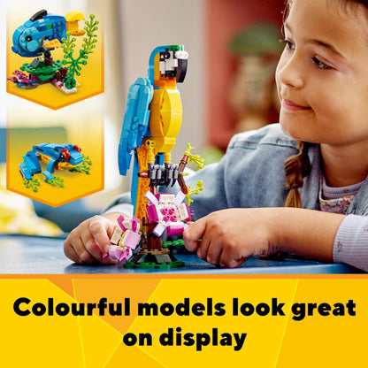 LEGO Creator 3 in 1 set featuring an exotic parrot, frog, and fish animal figures in vibrant colors for kids.