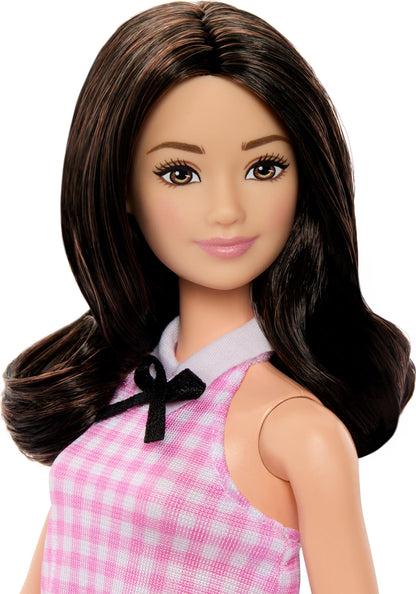 Barbie Fashionistas Doll #224 with black wavy hair, pink gingham dress, accessories, celebrating 65th anniversary, collectible toy