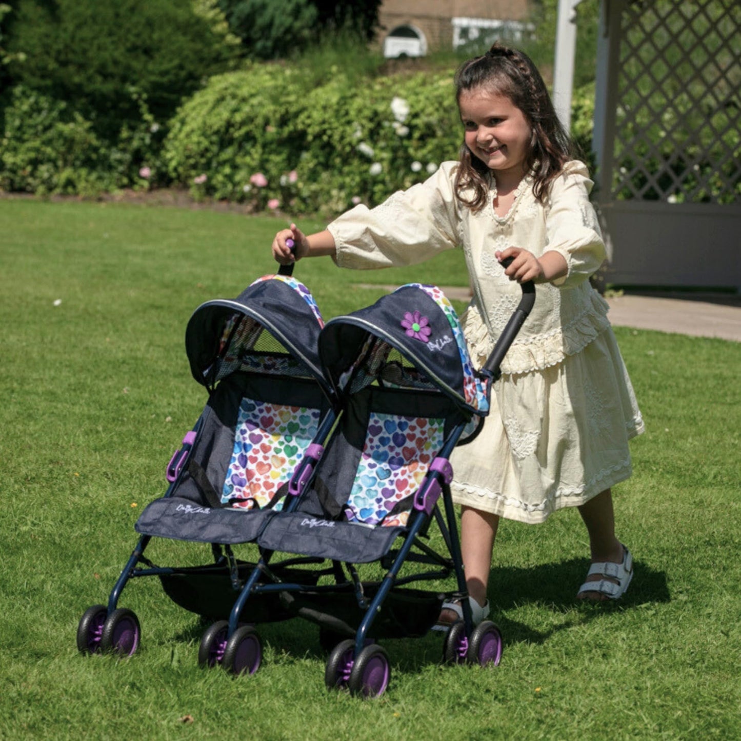 Daisy Chain Zipp Twin Max Dolls Pushchair – Adjustable handles from 76-82cm. For ages 4,5,6,7,8 or 9 years. (Rainbow Hearts)