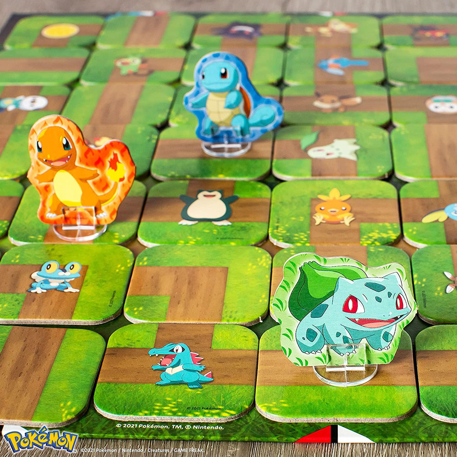 Ravensburger Pokemon Labyrinth board game showing a colorful maze with Pokemon characters for kids ages 7 and up.