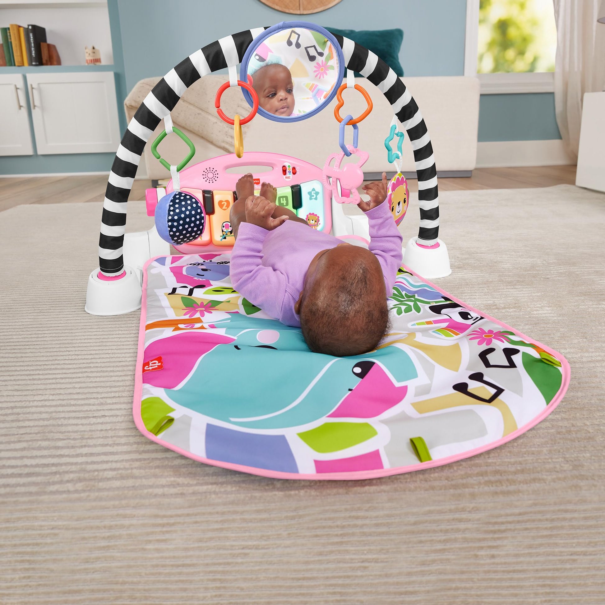 Fisher-Price Baby Activity Mat Glow and Grow Kick & Play Piano Gym with colorful toys and soft pink fabric for infants 0+ months