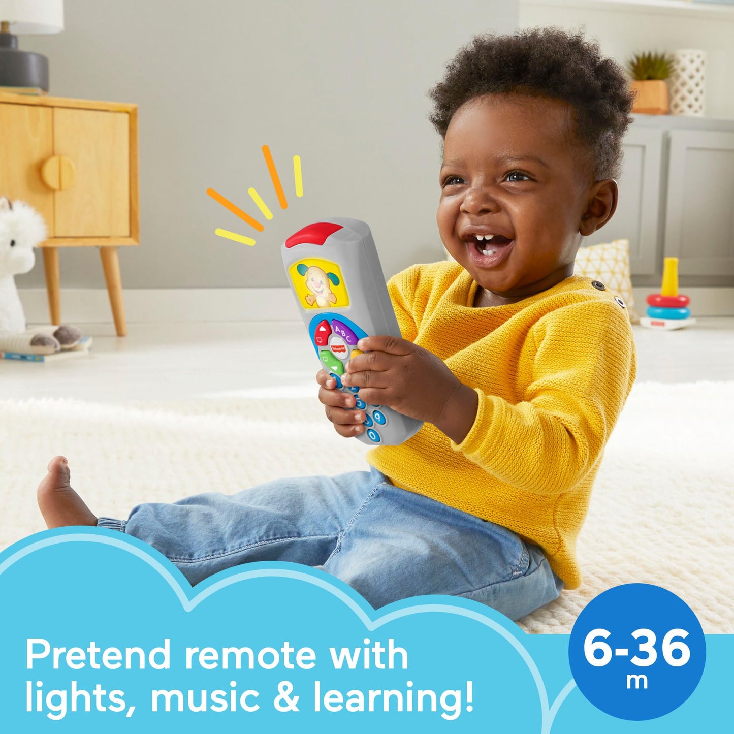 Fisher-Price Laugh and Learn Remote toy with light-up screen, push buttons, and 35+ sing-along songs for early childhood development