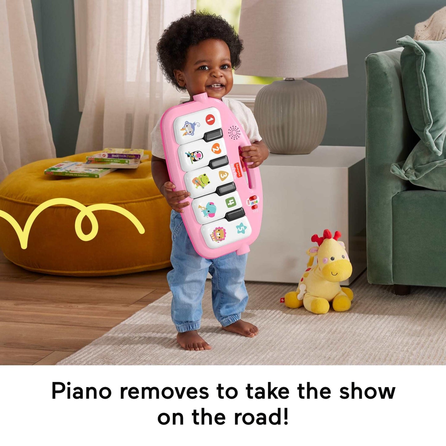 Fisher-Price Baby Activity Mat Glow and Grow Kick & Play Piano Gym with pink fabric, musical toys, and colorful hanging objects.