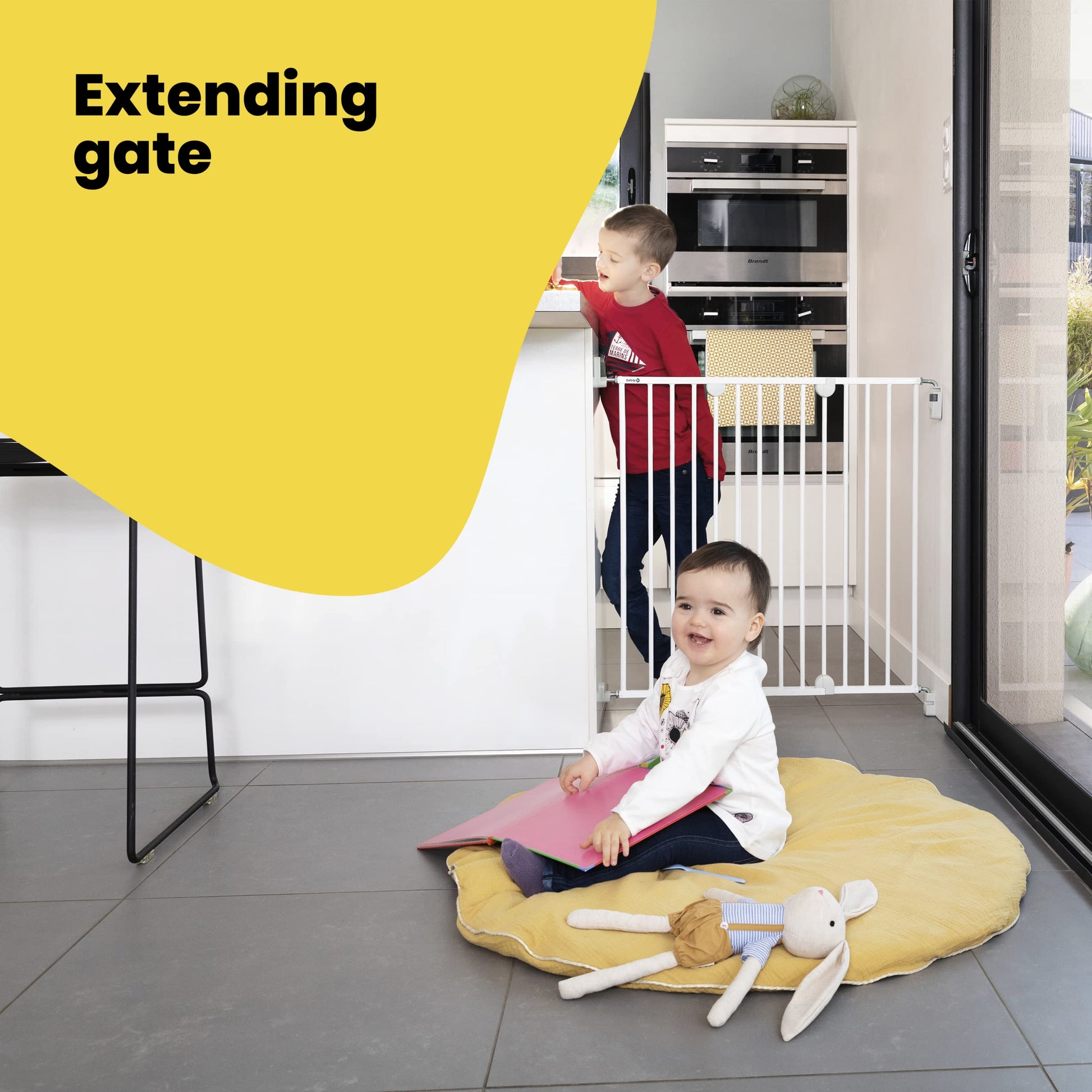 Safety 1st wall mount metal baby gate extended to 102cm, white, with one-hand opening and easy installation for stair safety.