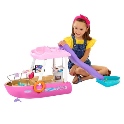 Barbie Dream Boat playset with pool, slide, dolphin, and over 20 accessories, showcasing a vibrant marine-themed scene.